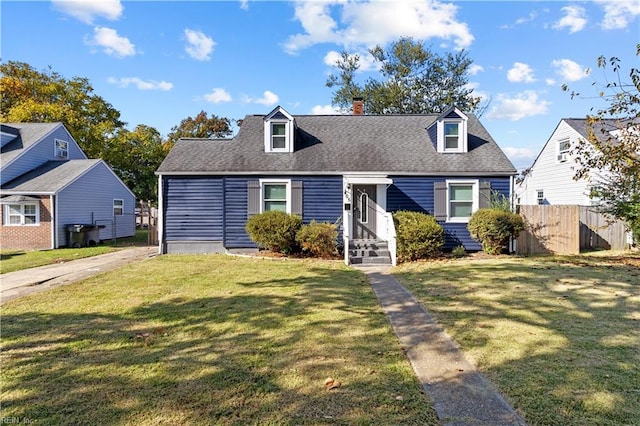 new england style home with a front yard