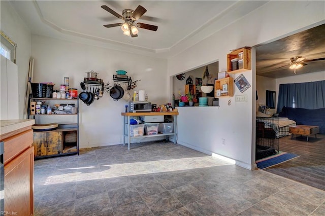 misc room featuring hardwood / wood-style floors and ceiling fan