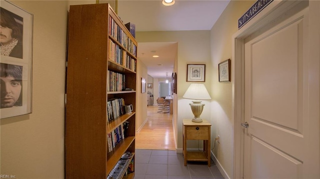 hallway featuring tile patterned floors