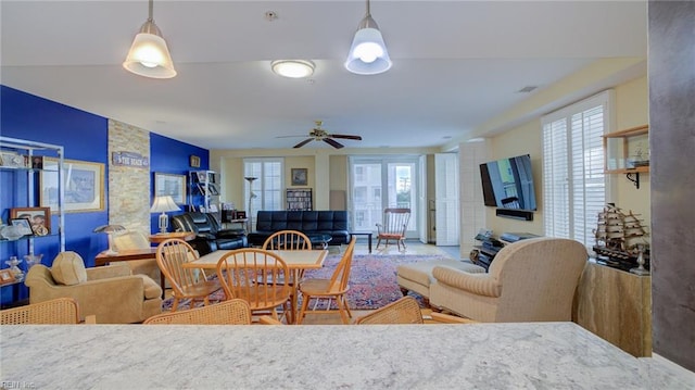 living room featuring ceiling fan