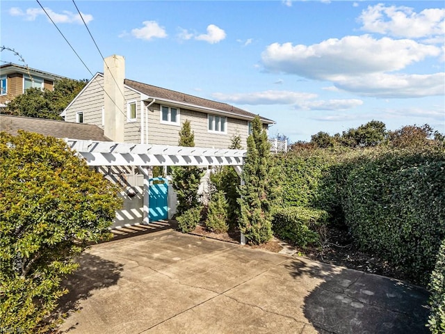 back of property with a patio area