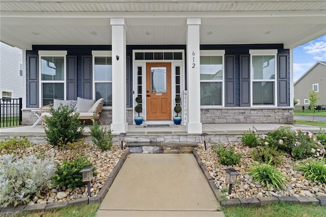 entrance to property with covered porch