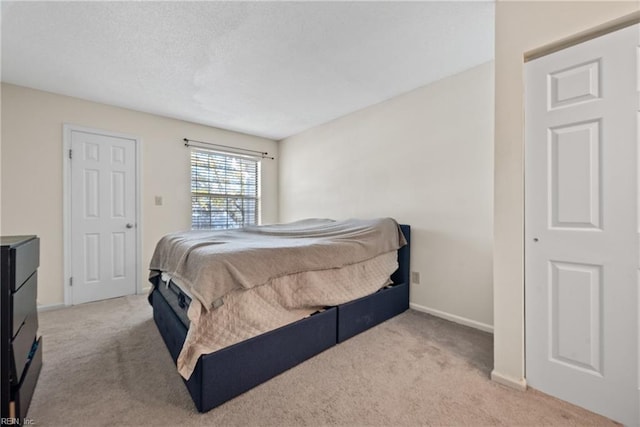 bedroom with light colored carpet