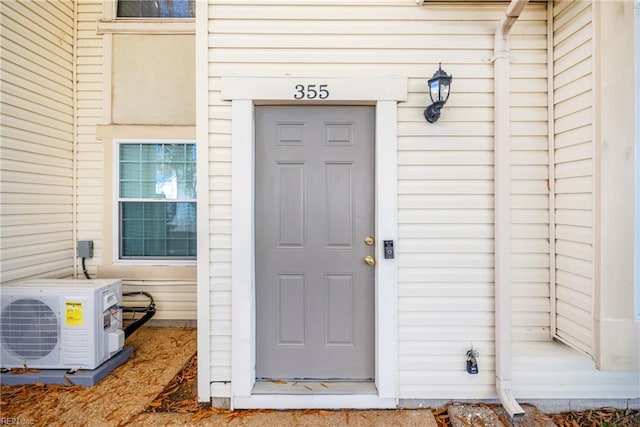 property entrance with ac unit