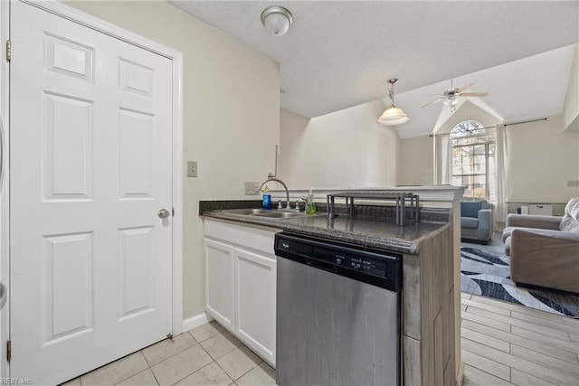 kitchen with white cabinetry, sink, ceiling fan, stainless steel dishwasher, and kitchen peninsula