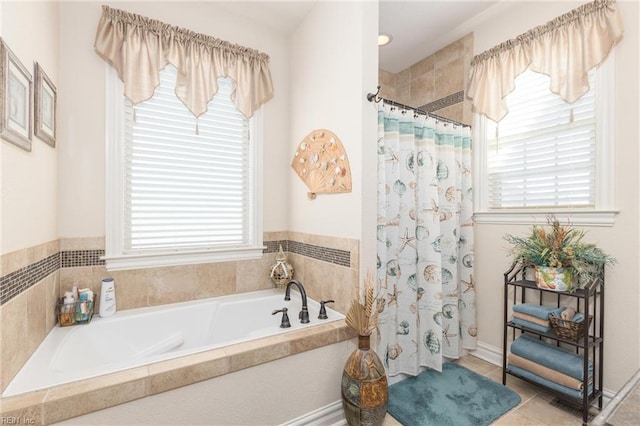 bathroom featuring separate shower and tub, tile patterned flooring, and plenty of natural light