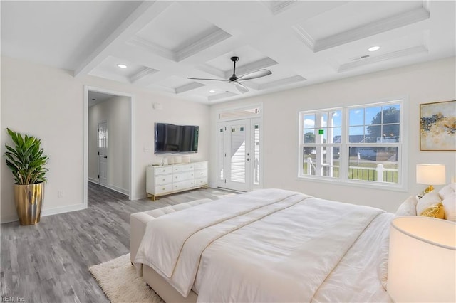 bedroom with beamed ceiling, light hardwood / wood-style flooring, ceiling fan, and coffered ceiling