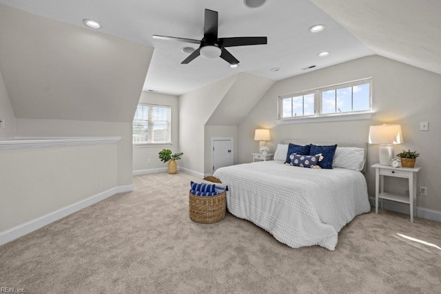 bedroom with carpet flooring, ceiling fan, and lofted ceiling