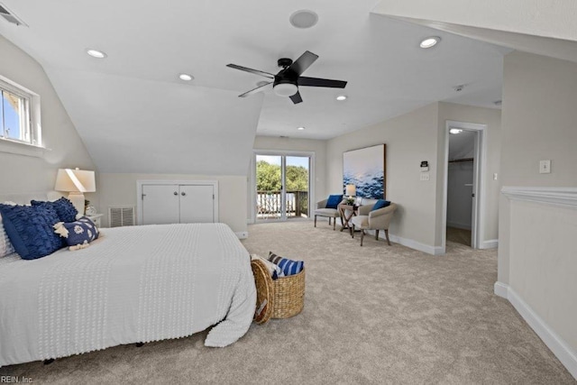 bedroom with ceiling fan, access to exterior, lofted ceiling, and a closet