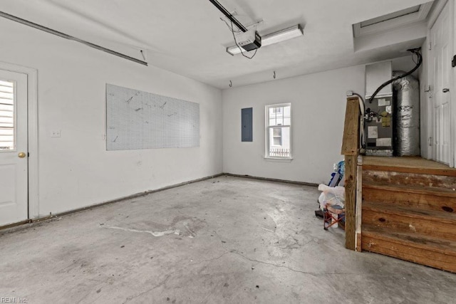 garage featuring a garage door opener and electric panel