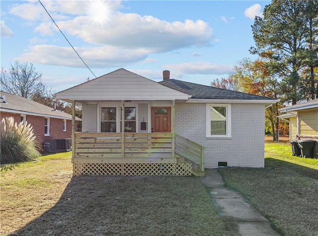 bungalow-style house with a front yard