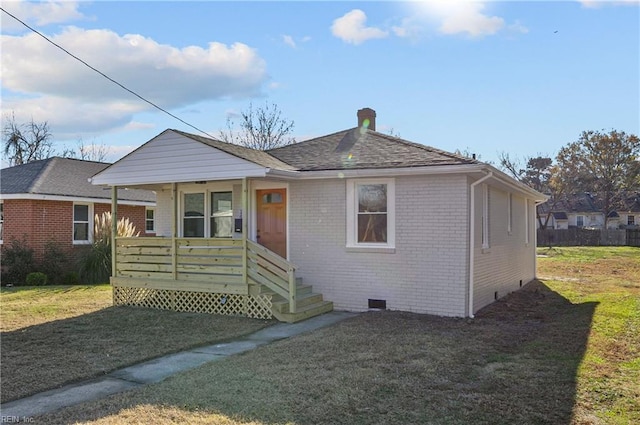 bungalow featuring a porch and a front yard