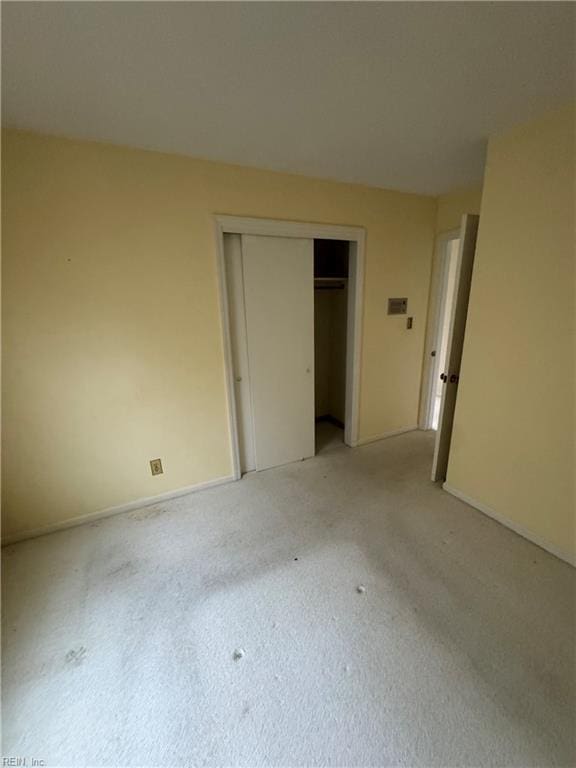 unfurnished bedroom featuring a closet