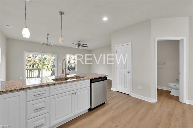 kitchen featuring white cabinetry, dishwasher, ceiling fan, sink, and light hardwood / wood-style flooring