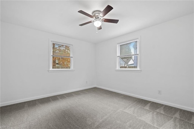 unfurnished room featuring carpet flooring and ceiling fan