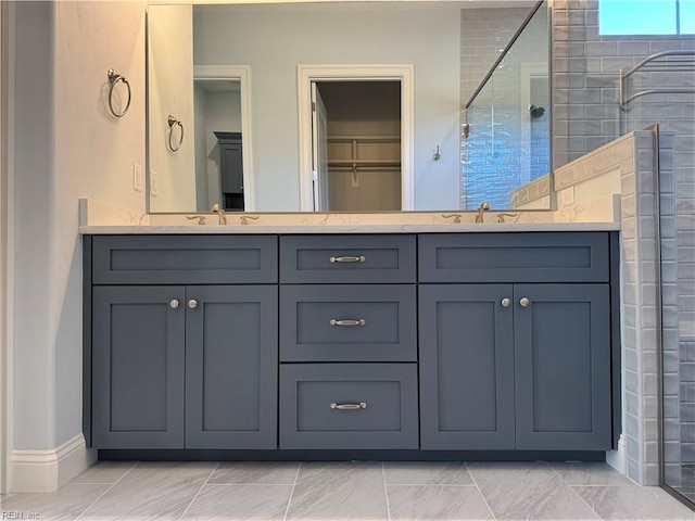 bathroom featuring vanity and walk in shower