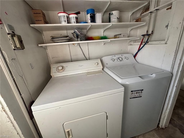 washroom featuring washer and dryer