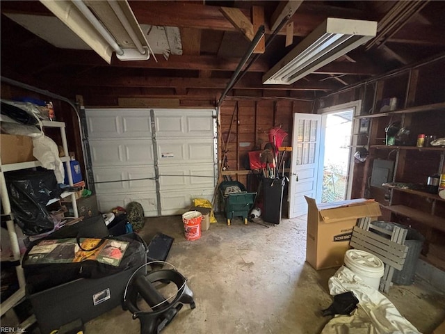 garage with wood walls