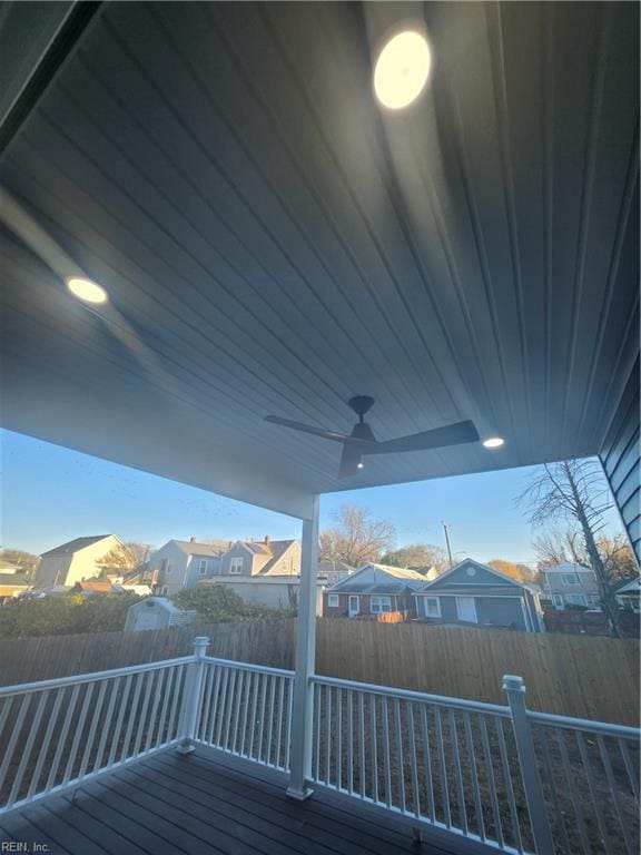 wooden deck with ceiling fan