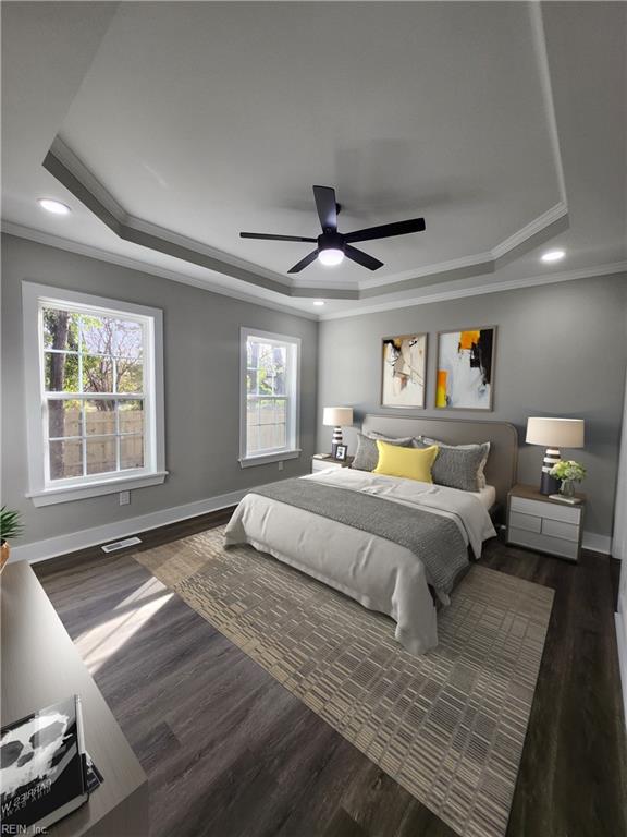 bedroom with ornamental molding, a raised ceiling, ceiling fan, and dark wood-type flooring