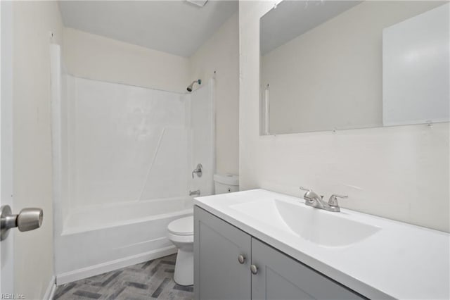 full bathroom with vanity,  shower combination, and toilet