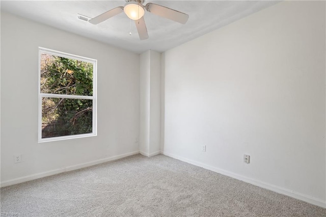 carpeted empty room with ceiling fan