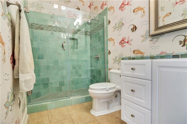 bathroom featuring toilet, tile patterned flooring, and walk in shower