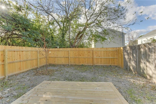 view of yard with a wooden deck