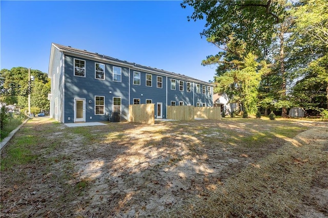 back of house with a patio area