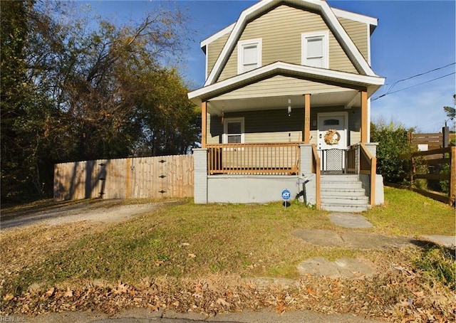 view of front of property featuring covered porch