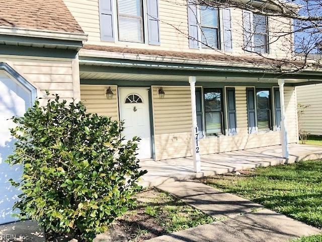 property entrance featuring covered porch