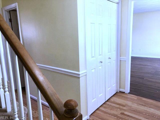 corridor featuring light hardwood / wood-style floors