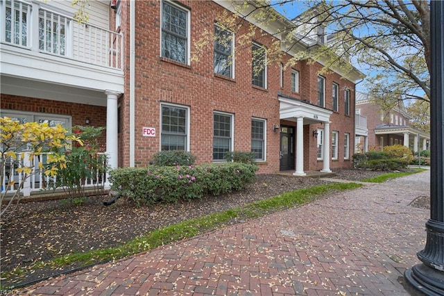 view of property exterior featuring a balcony