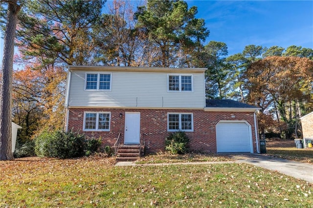 view of front facade featuring a front yard and a garage