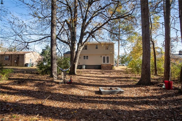 view of yard featuring french doors