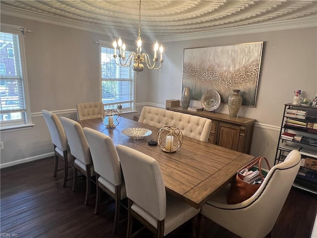 dining room featuring ornamental molding, dark wood-type flooring, and a wealth of natural light