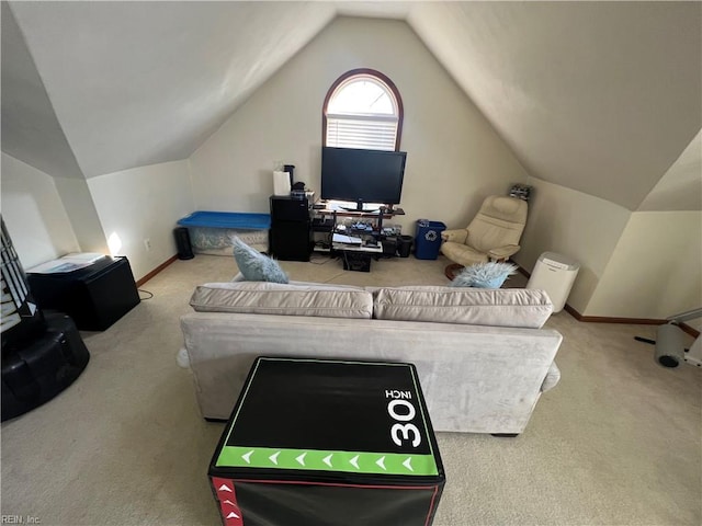 living room with carpet and vaulted ceiling