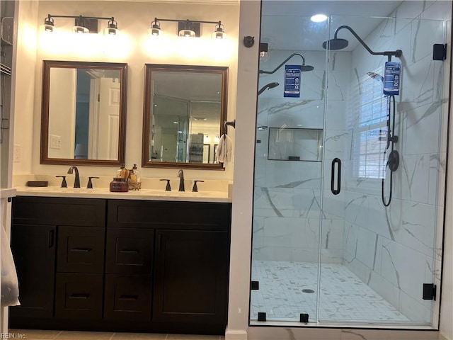 bathroom with vanity and an enclosed shower