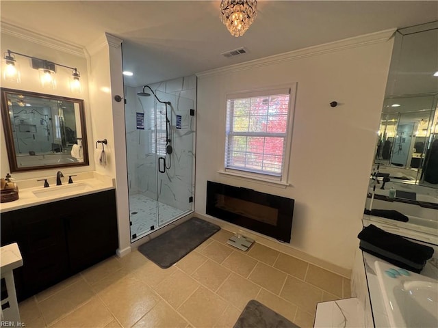 bathroom with walk in shower, tile patterned floors, vanity, and ornamental molding