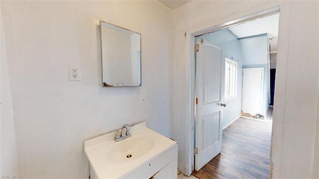 bathroom featuring vanity and hardwood / wood-style flooring