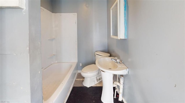 bathroom featuring tile patterned floors, sink, and toilet