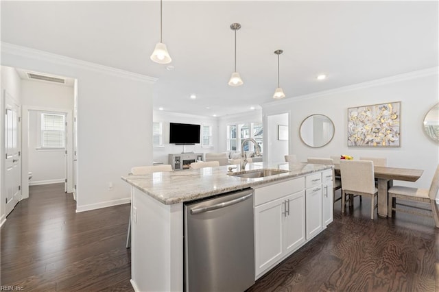 kitchen featuring sink, stainless steel dishwasher, an island with sink, decorative light fixtures, and white cabinets