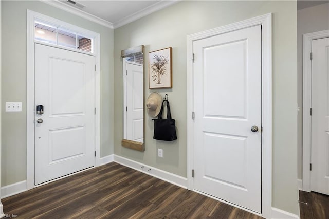 entryway featuring dark hardwood / wood-style floors and crown molding