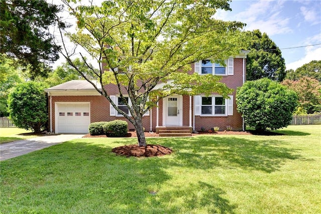 view of front of home featuring a front lawn and a garage