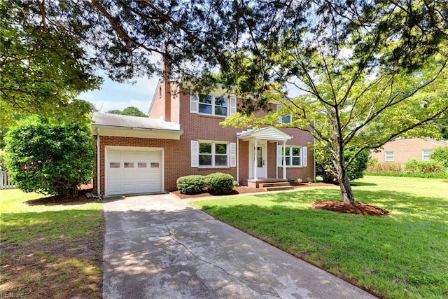 colonial home featuring a garage and a front lawn