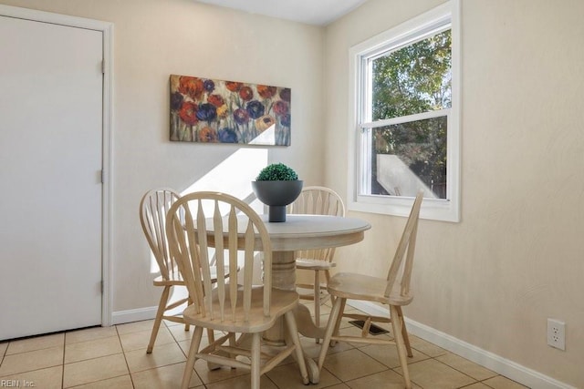 view of tiled dining area