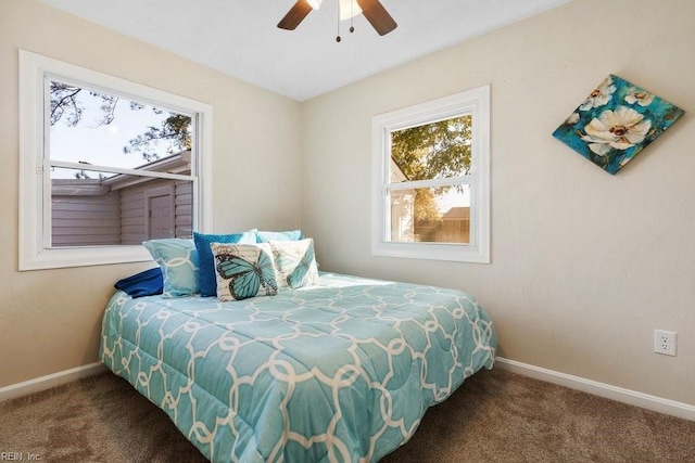 carpeted bedroom with ceiling fan