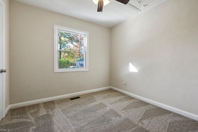 unfurnished room featuring carpet