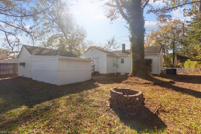 view of home's exterior with a yard