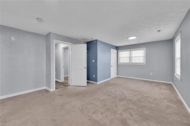 interior space with a textured ceiling